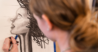 image of a student drawing