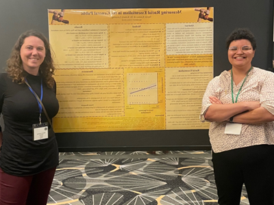 Image of student and faculty member presenting research at the Eastern Psychological Association.